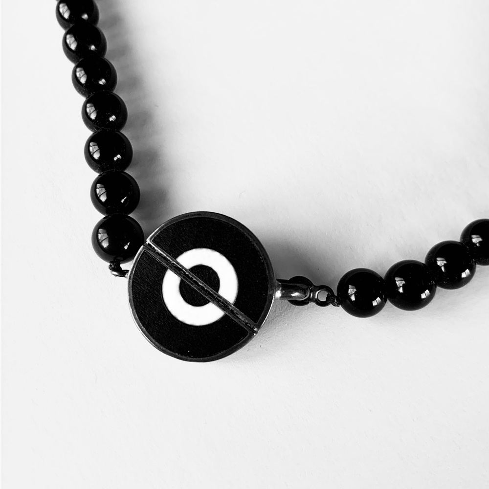 Vintage black onyx strand necklace with amazing centerpiece / clasp.